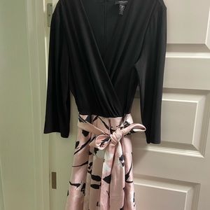 Beautiful pink mid-length formal dress with large sash